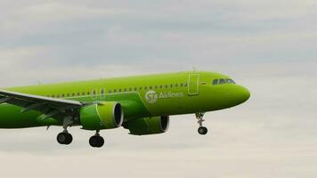 NOVOSIBIRSK, RUSSIAN FEDERATION JULY 15, 2022 - Airbus A320, RA 73453 of S7 Airlines landing at Tolmachevo airport, side view. Footage of a passenger plane arriving. Tourism and travel concept video