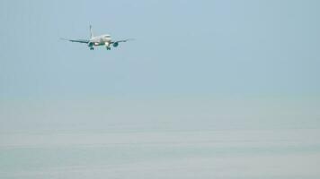 SOCHI, RUSSIA JULY 30, 2022 - Commercial airplane of Ural Airlines landing at Sochi airport. Passenger airliner is approaching, descending video