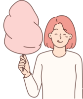 Cheerful girl with cotton candy in hands licks lips in anticipation taste of street dessert png