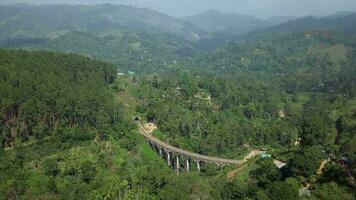 Aerial View drone 4k footage Of Famous Nine Arches Bridge Sri Lanka Railway Train With. Nine Arches Bridge In Ella, Sri Lanka. video