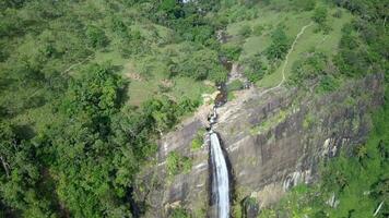 Aerial View drone 4k footage Of Diyaluma falls waterfall in  Sri Lanka. video