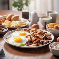 Fried eggs and bacons and fried mushrooms on the table photo