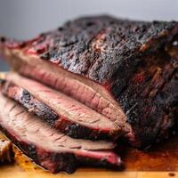 Thickly cut slice of smoked of juicy brisket photo