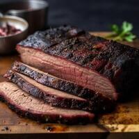 Thickly cut slice of smoked of juicy brisket photo