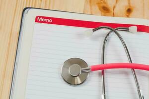 Memo book for health record and remind to do with a good health. photo