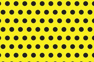 simple abstract seamlees black polka dot pattern on yellow background vector