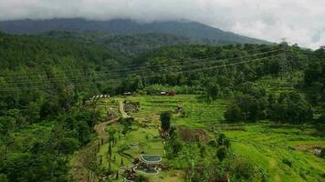 Bandung June 12 2022. Aerial view of public park and traditional hotel in hills, in Bandung City, West Java - Indonesia. video