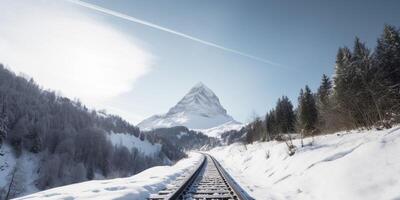 Snow covered landscapes and mountains in background photo