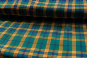 A beautiful plaid pattern background. Scottish tartan. A Fabric pattern. photo