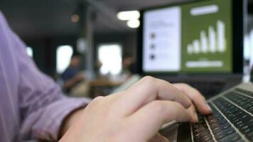 Selective focus, Hands of young adult woman use laptop computer in outdoors coffee shop video