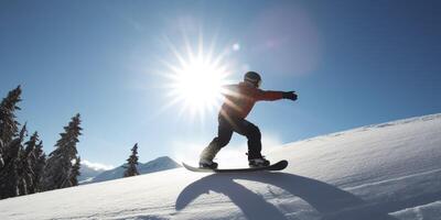 Snowboarder is going down on a mountain photo