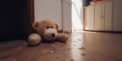 A room with a teddy bear on floor photo