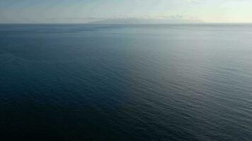 Aerial view of the Atlantic Ocean on the background of a beautiful sunset video