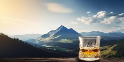 Glass of drink in forest landscape photo