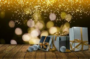 Christmas presents laid on a wooden table background photo