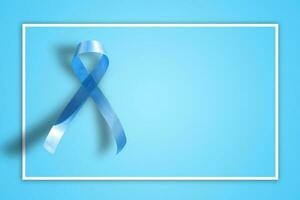 blue ribbon on blue background representing an annual event during the month of November to raise awareness of men's health issues and prostate cancer with copy space photo