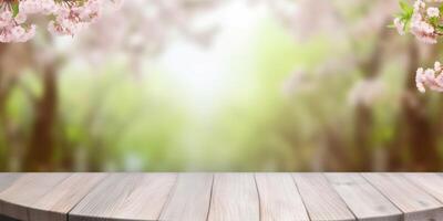 Empty wooden table with spring blur background photo