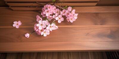 wooden table with cherry blossom photo