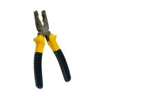 yellow pliers isolated on white background photo