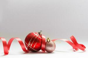 christmas decoration ball with ribbon bow isolated on white background photo