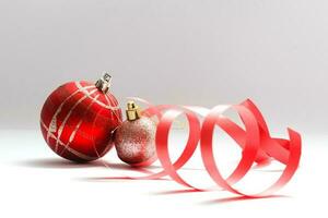 christmas decoration ball with ribbon bow isolated on white background photo