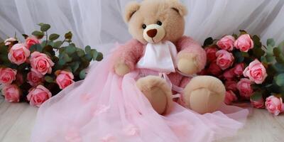 teddy bear with pink flowers and pink dress photo