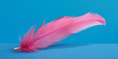 rosado pluma es mostrado en azul antecedentes ai generado foto