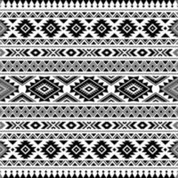 Geometric seamless tribal pattern in black and white colors. Aztec ethnic style print template for textile design, fabric, clothes, curtain, carpet, batik, ornament, wallpaper, wrapping, paper. vector