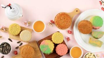 Mid Autumn Festival Food and Drink on Pink Background. photo