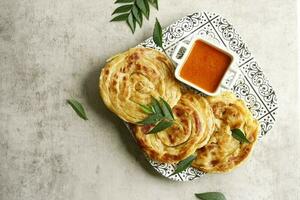 Homemade Paratha Bread with Curry photo
