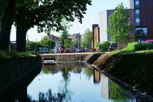 Beautiful Low Angle View of  Local Public Park and Edge of River Great Ouse of Historical Bedford City of England Great Britain of UK. The Image Was Captured on 28-May-2023 photo