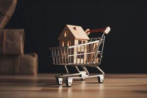 A house in a shopping cart on wooden and black background. Concept of buying real estate. . photo