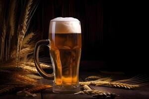 Glass of light wheat beer and wheat ears on wooden table on black background with copy space. . photo