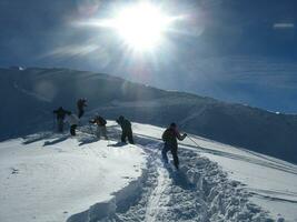 Climbers ascending the mountain photo