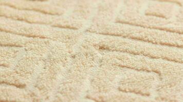 closeup loopable background of beige soft cotton towel video