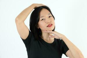 Young attractive south east asian woman pose face expression emotion on white background photo