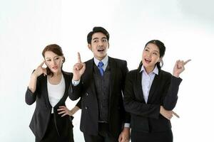 Southeast Asian young office business man woman wearing suit point finger showing up expressions idea thinking wonder wow on white studio background photo