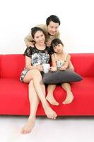 South East Asian young father mother daughter son parent girl child activity indoor photo