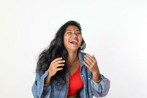 Young attractive Asian Indian woman pose face body expression mode emotion on white background laugh happy photo