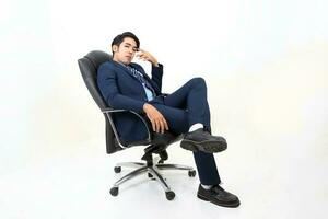 South east Asian Malay Man facial expression sit on chair thinking photo