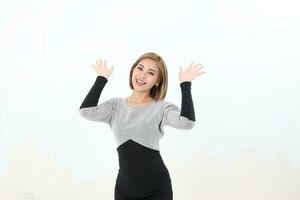 South east Asian Chinese Woman facial expression stand happy smile hands wave in air photo