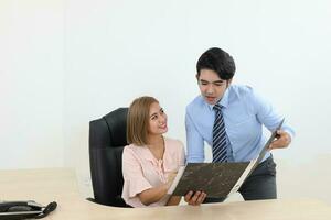 Asian young man woman malay chinese office confident happy sit stand talk discuss show see document file folder photo