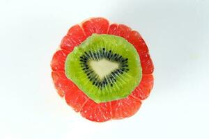 Sliced fruit stack grapefruit kiwi photo