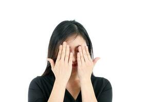 Facial Expression Young Asian woman office attire white background hand on eye photo