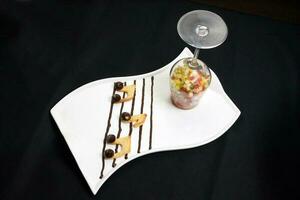 Musical note cookie biscuit and fruit salad photo