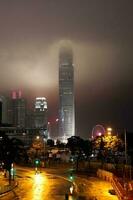 Hong Kong, Central-January 26, 2020  The Hong Kong International Finance Center in cloudy weather. The roads are empty for new year holiday and fear of Novel coronavirus, 2019-nCoV, COVID-19. photo