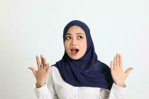 South east Asian Malay Woman headscarf facial expression surprised photo