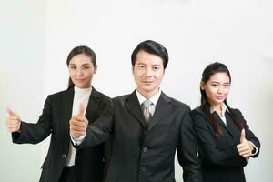 Young Asian man woman wearing business office suit stand white background photo