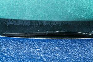 Car Windshield Wipers in Freezing Winter Condition photo