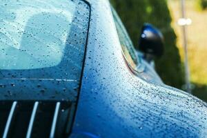 Wet Clean Modern Car Body Close Up photo